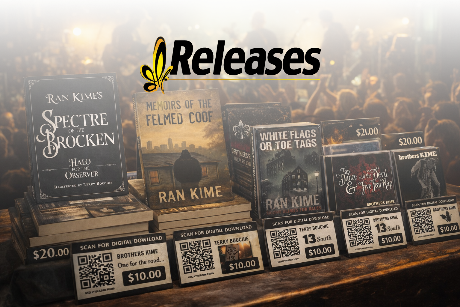 Display of books and music releases by dlt Productions artists on a table