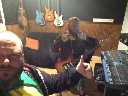 Ran Kime and Wes Kime giving thumbs up in brothers KIME recording studio