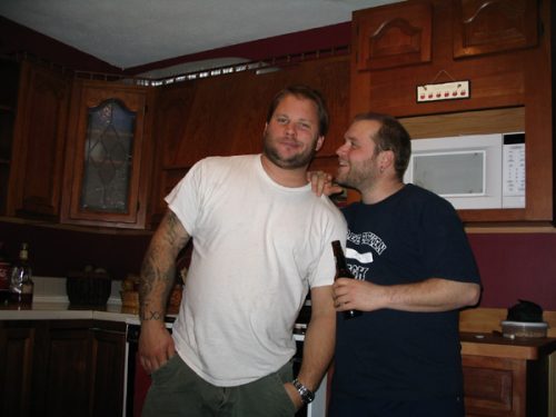 Candid moment of brothers KIME—Ran Kime and Wes Kime—relaxing between sessions, capturing the humor, brotherhood, and grit behind their music.