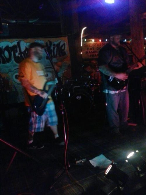 Live performance by brothers KIME at KC Rib Shack, featuring Ran Kime and Wes Kime delivering raw, loud, and honest independent rock.