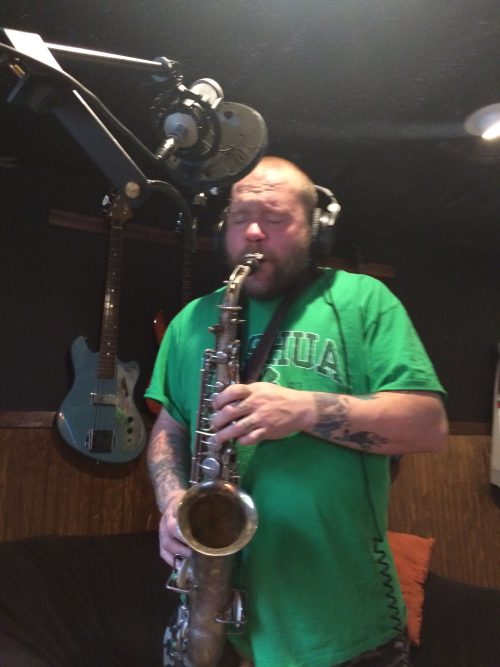 Wes Kime recording saxophone at Winter Hill Studios, adding layered textures and live instrumentation to Brothers KIME recordings.