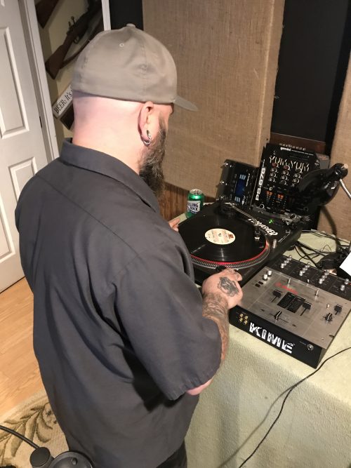 Vinyl scratching at Winter Hill Studios during a brothers kime session, blending analog grit with modern DIY production.